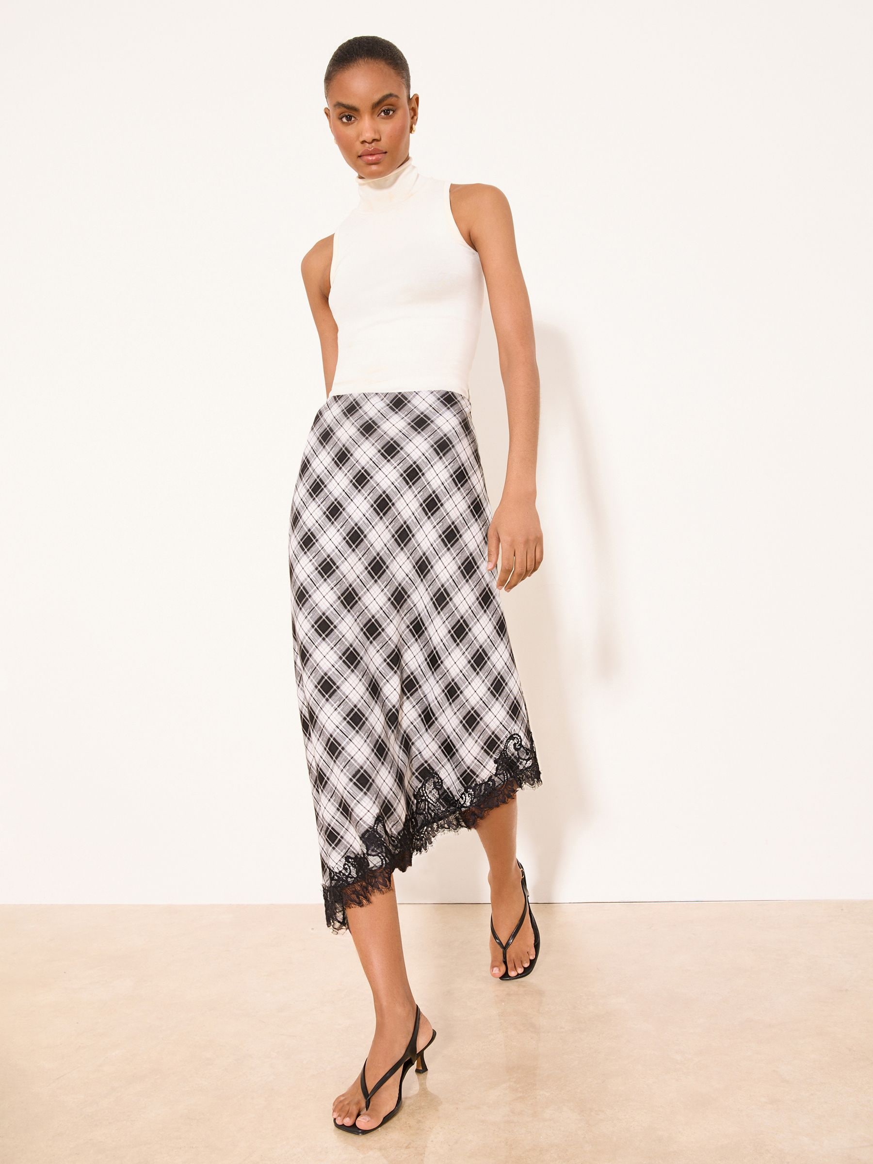 Buy Lipsy Black & White Check Asymmetrical Lace Hem Midi Skirt