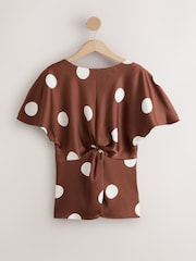 Chocolate Brown/Ecru Polka Dot Textured Satin Short Sleeve Twist Front Top - Image 1 of 3