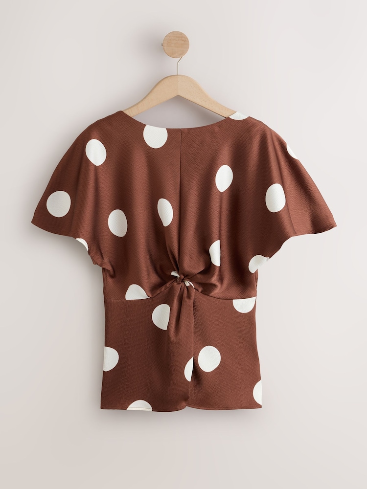 Chocolate Brown/Ecru Polka Dot Textured Satin Short Sleeve Twist Front Top - Image 1 of 3