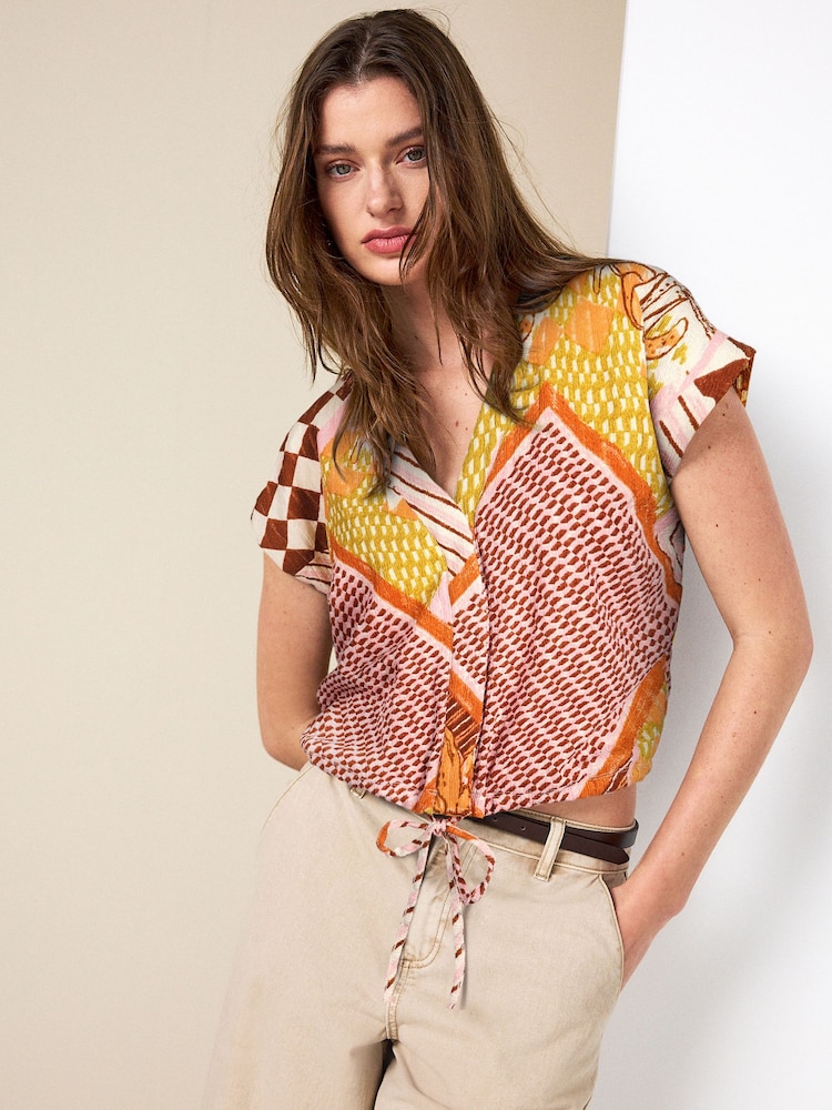 Ochre Geo Print Textured V-Neck Tie Front Short Sleeve Top - Image 1 of 4 Ochre Geo Print Textured V-Neck Tie Front Short Sleeve Top - Image 1 of 4