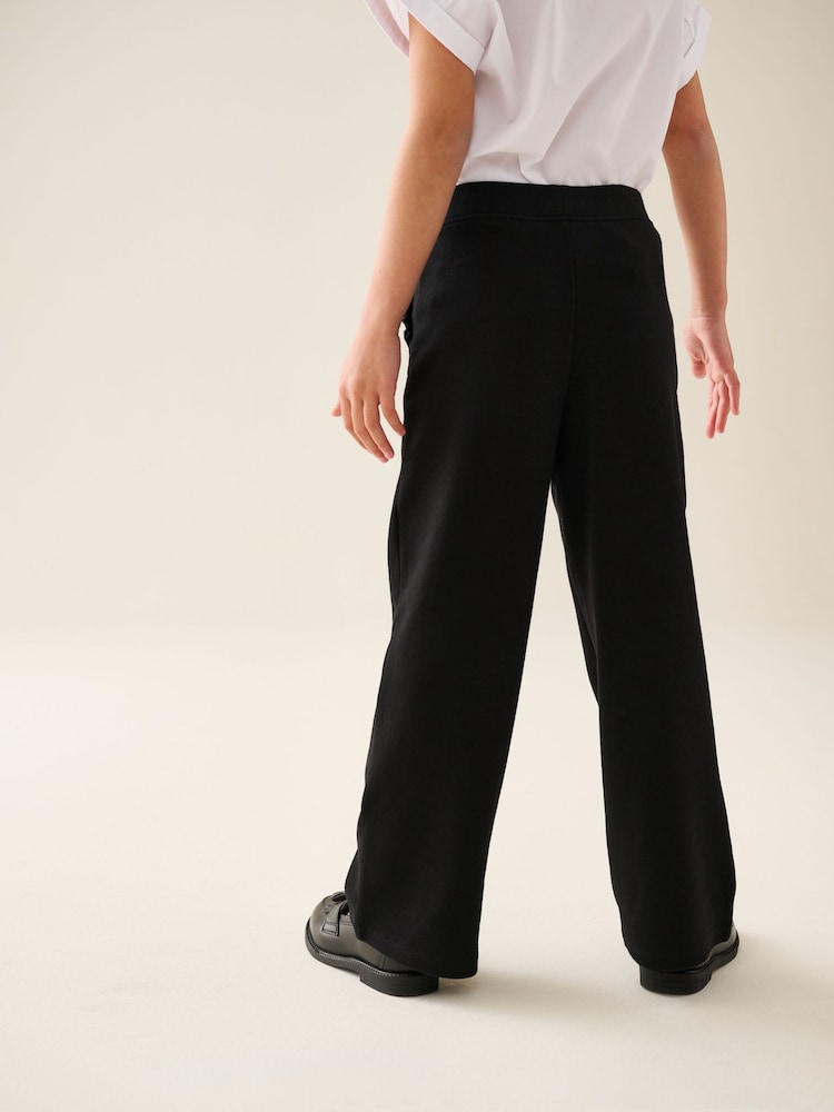 Negro - Pantalones escolares acampanados de alto contenido en algodón sin cierres (3-16 años) - Imagen 2 de 5 Negro - Pantalones escolares acampanados de alto contenido en algodón sin cierres (3-16 años) - Imagen 2 de 5