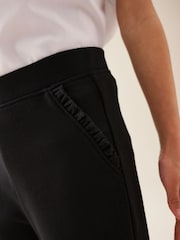 Negro - Pantalones escolares acampanados de alto contenido en algodón sin cierres (3-16 años) - Imagen 3 de 5