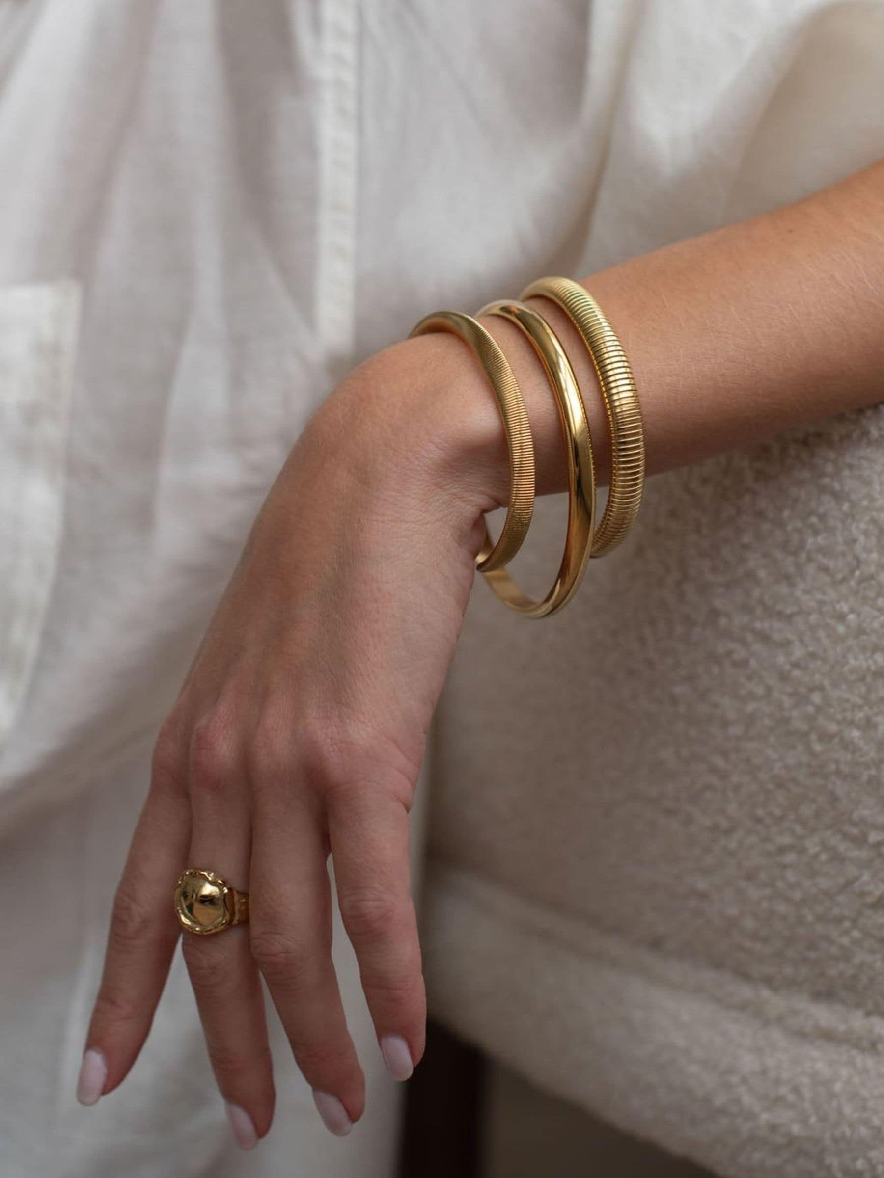 Buy D.Louise Gold Tone Waterproof Classic Chunky Bangle from Next