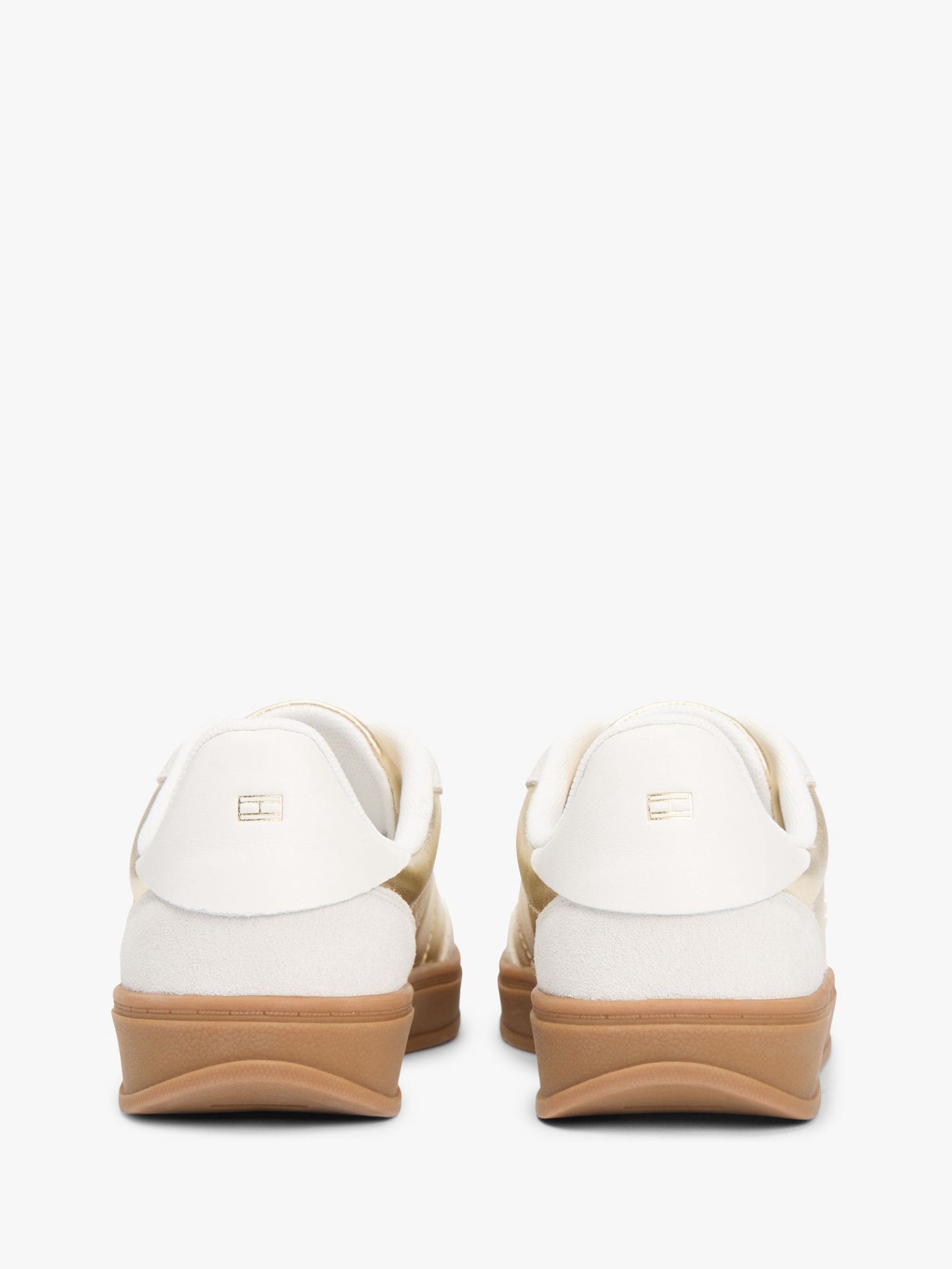 Buy Tommy Hilfiger Gold Monogram Metallic Leather Trainers from