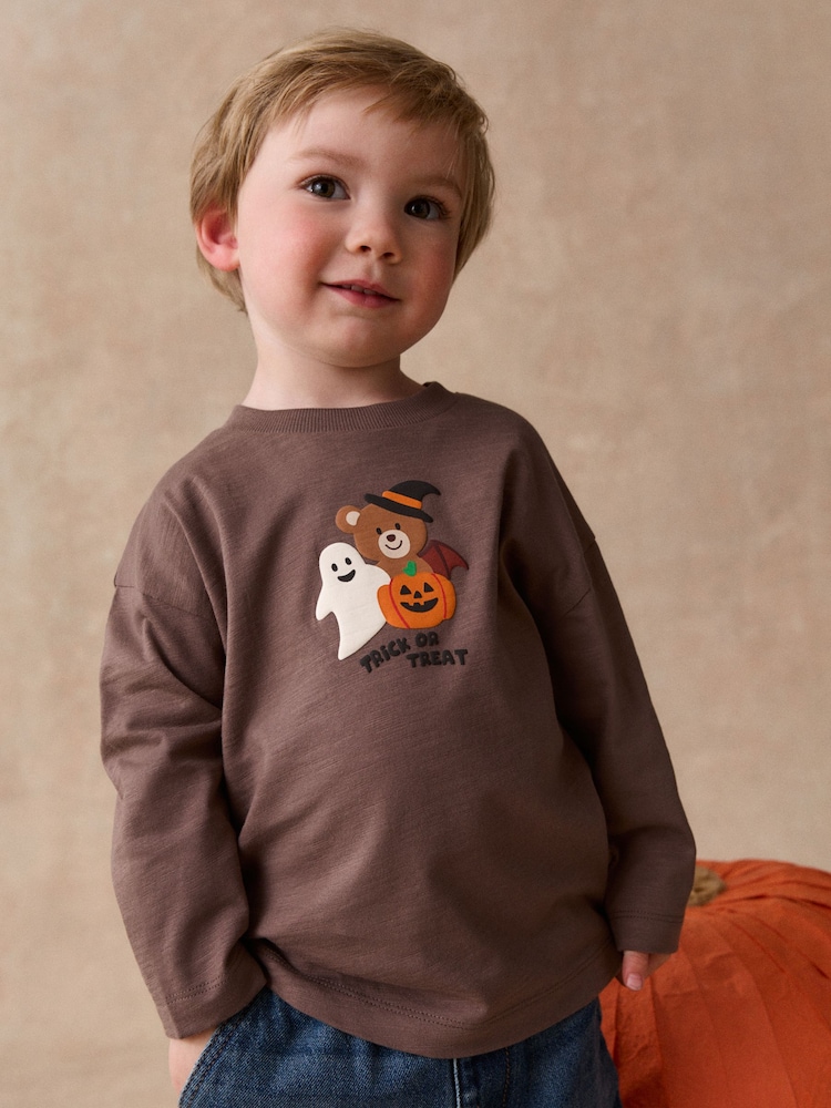 Brown Halloween Trick or Treat Character Long Sleeve Back Graphic T-Shirt (3mths-7yrs) - Image 1 of 4 Brown Halloween Trick or Treat Character Long Sleeve Back Graphic T-Shirt (3mths-7yrs) - Image 1 of 4