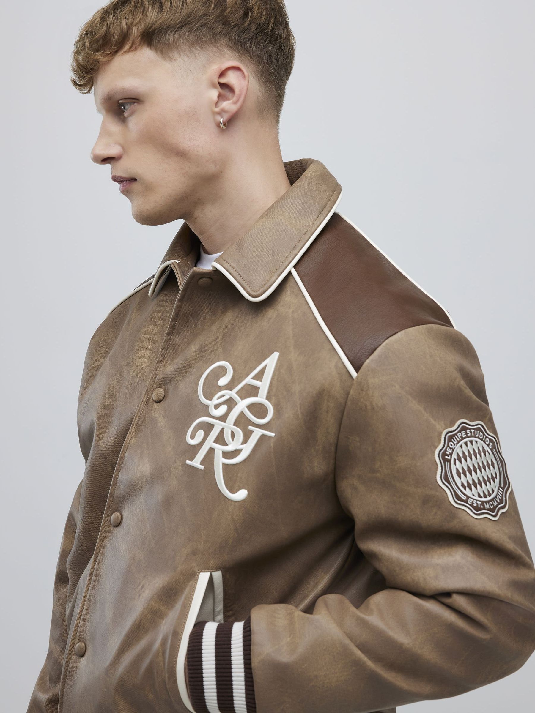 Buy River Island Brown Marbled Faux Leather Varsity Jacket from
