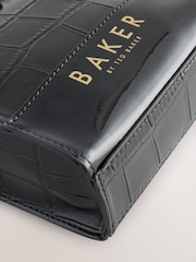 Bolso bandolera infantil negro con estampado de cocodrilo y lazo de Baker by Ted Baker - Imagen 4 de 6