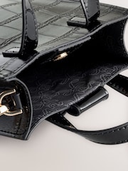 Bolso bandolera infantil negro con estampado de cocodrilo y lazo de Baker by Ted Baker - Imagen 5 de 6