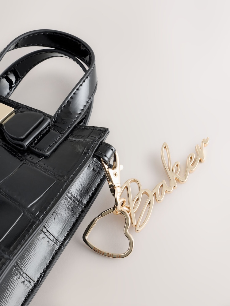 Bolso bandolera infantil negro con estampado de cocodrilo y lazo de Baker by Ted Baker - Imagen 6 de 6 Bolso bandolera infantil negro con estampado de cocodrilo y lazo de Baker by Ted Baker - Imagen 6 de 6