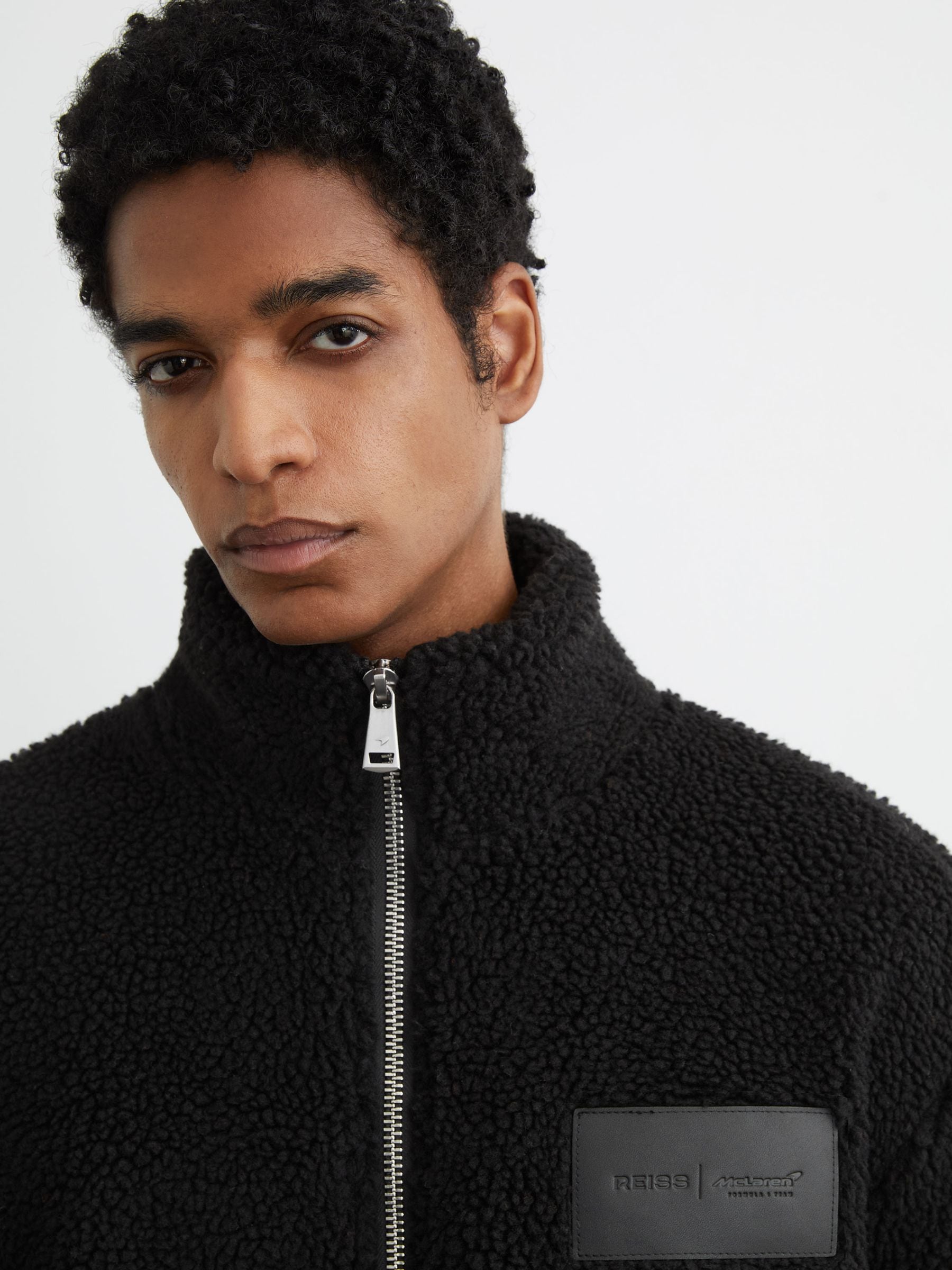 Buy Mclaren Black Nylo McLaren Racing Logo Fleece Jacket Unisex