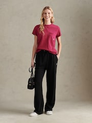 أسود Ground - بنطلون رياضي نسائي بشعار فارسين متناسق بحافة قابلة للطي من U.S. Polo Assn - صورة 6 من 9