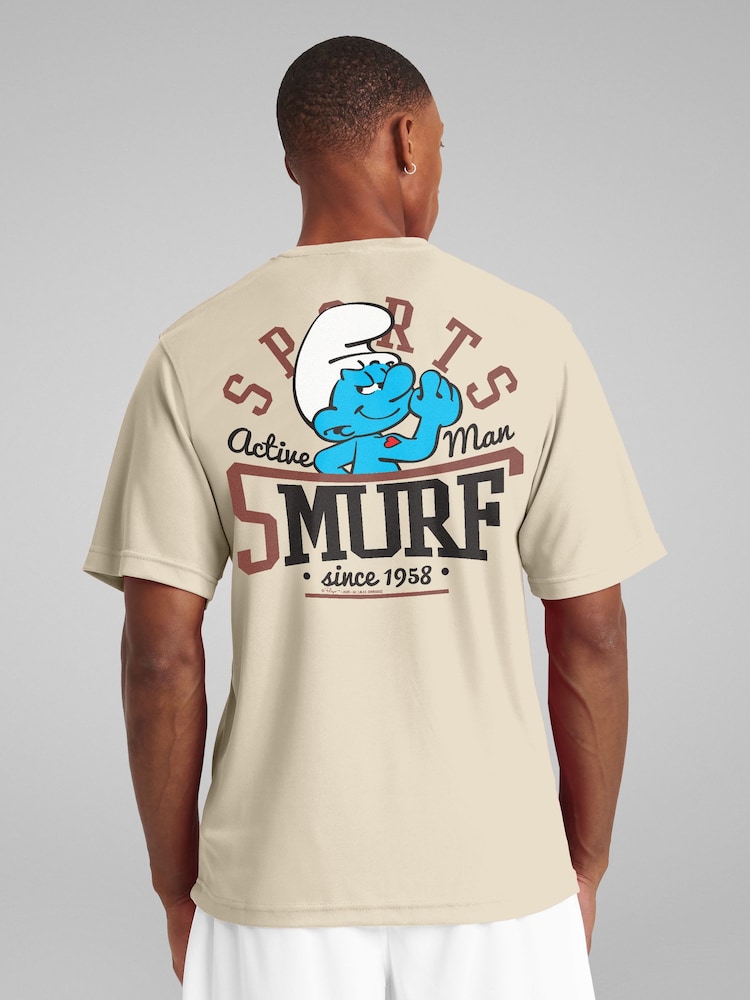 All + Every Cream Hefty Smurf Active Man College Sports Smurfs Movie Back Print T-Shirt - Image 1 of 1 All + Every Cream Hefty Smurf Active Man College Sports Smurfs Movie Back Print T-Shirt - Image 1 of 1
