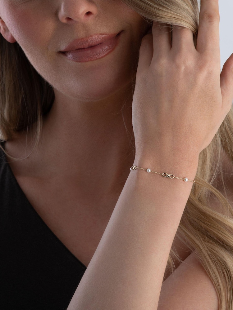 Beaverbrooks 9ct Yellow Gold Plated Freshwater Cultured Pearl Infinity Bracelet - Image 4 of 4 Beaverbrooks 9ct Yellow Gold Plated Freshwater Cultured Pearl Infinity Bracelet - Image 4 of 4