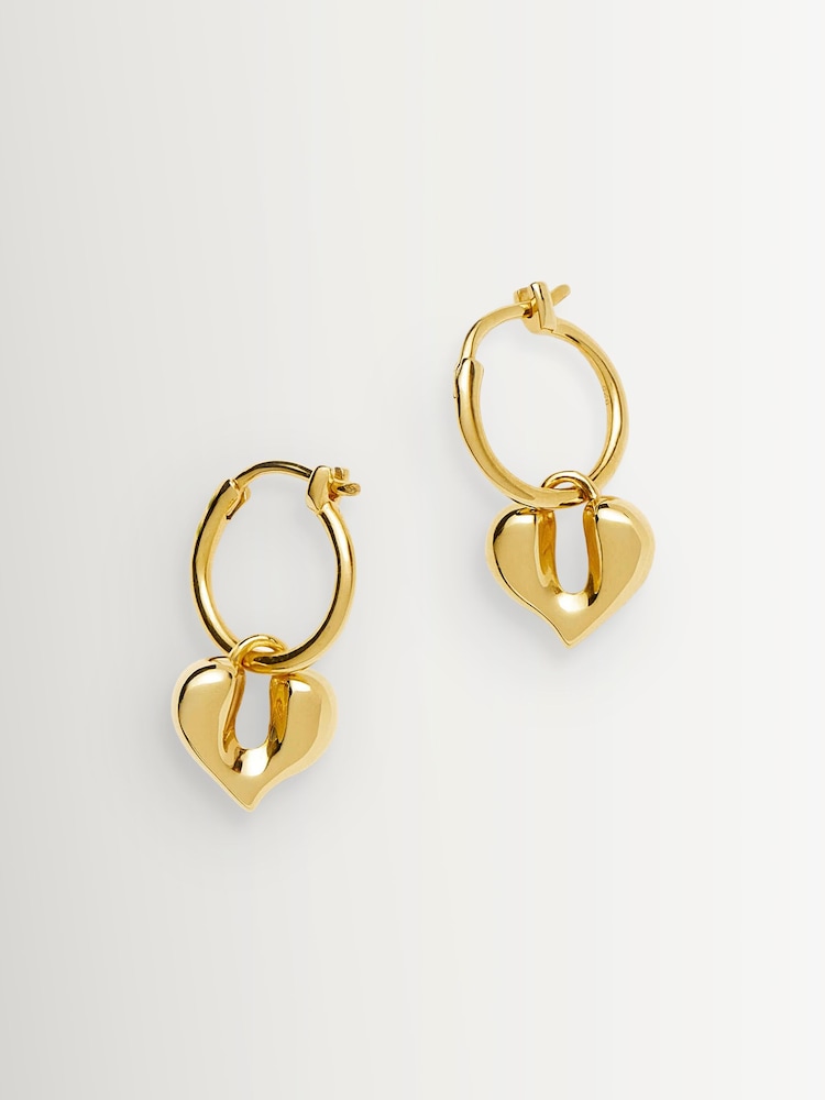 Missoma Gold Tone Molten Heart Charm Hoop Earrings - Image 1 of 3 Missoma Gold Tone Molten Heart Charm Hoop Earrings - Image 1 of 3