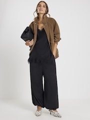 River Island Black Satin High Waisted Balloon Leg Trousers - Image 1 of 4