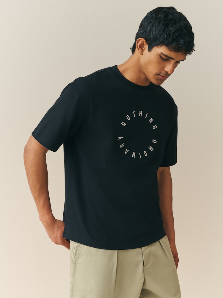 Nothing Ordinary Black Master Font Circle Relaxed Fit Graphic Heavyweight T-Shirt - Image 1 of 5