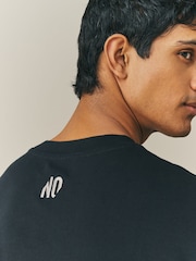 Nothing Ordinary Black Master Font Circle Relaxed Fit Graphic Heavyweight T-Shirt - Image 4 of 5