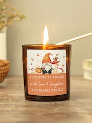 Personalised Autumn Gonk Amber Glass Candle by PMC - Image 1 of 3