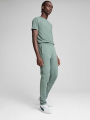Puma Green Mens Evostripe Trousers - Image 1 of 5