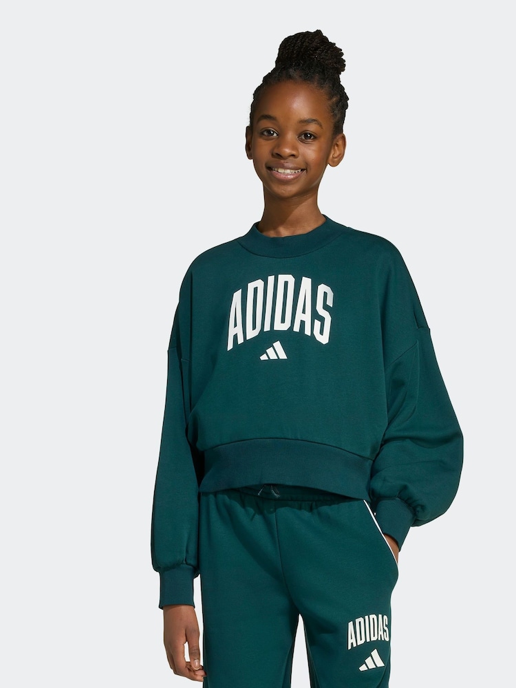 adidas Green Essentials Collegiate Kids Sweatshirt - Image 1 of 4 adidas Green Essentials Collegiate Kids Sweatshirt - Image 1 of 4