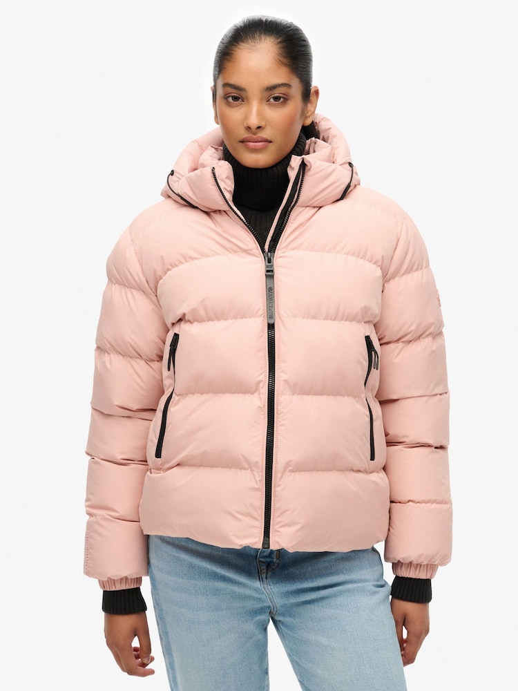 Superdry Pink Hooded Sports Puffer Jacket - Image 1 of 7 Superdry Pink Hooded Sports Puffer Jacket - Image 1 of 7