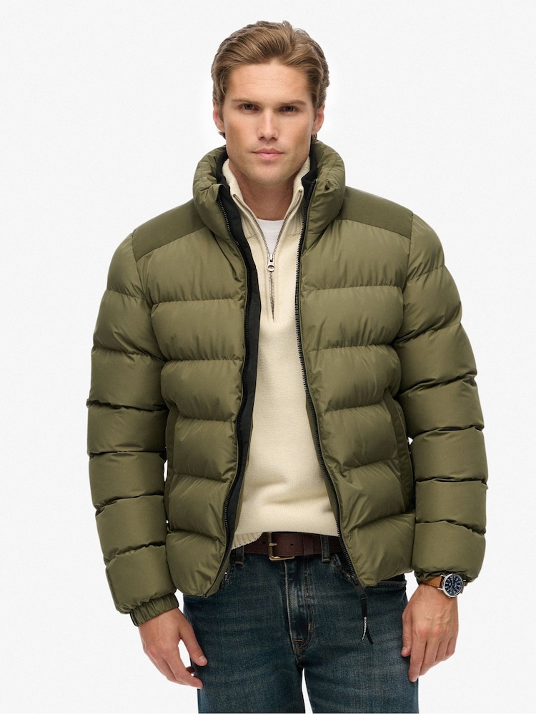 Superdry Green Sports Puffer Jacket - Image 1 of 7 Superdry Green Sports Puffer Jacket - Image 1 of 7