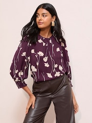 Friends Like These Burgundy Floral Print Petite 3/4 Sleeve Shirred Cuff Blouse - Image 1 of 4
