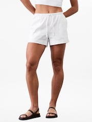 Athleta White Paradise Mid Rise Easy Shorts - Image 1 of 1