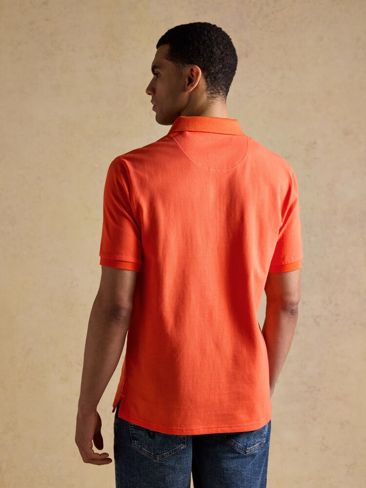 Joules Woody Bright Orange Cotton Pique Short Sleeve Polo Shirt - Image 2 of 9 Joules Woody Bright Orange Cotton Pique Short Sleeve Polo Shirt - Image 2 of 9