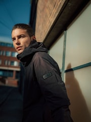Barbour® International Red Red Peckett Showerproof Jacket - Image 9 of 11