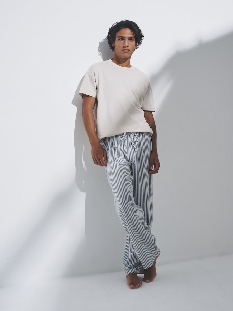 The Set Cream/Grey/Blue 3 Pack Jersey T-Shirt and Flannel Pyjamas - Image 1 of 6 The Set Cream/Grey/Blue 3 Pack Jersey T-Shirt and Flannel Pyjamas - Image 1 of 6