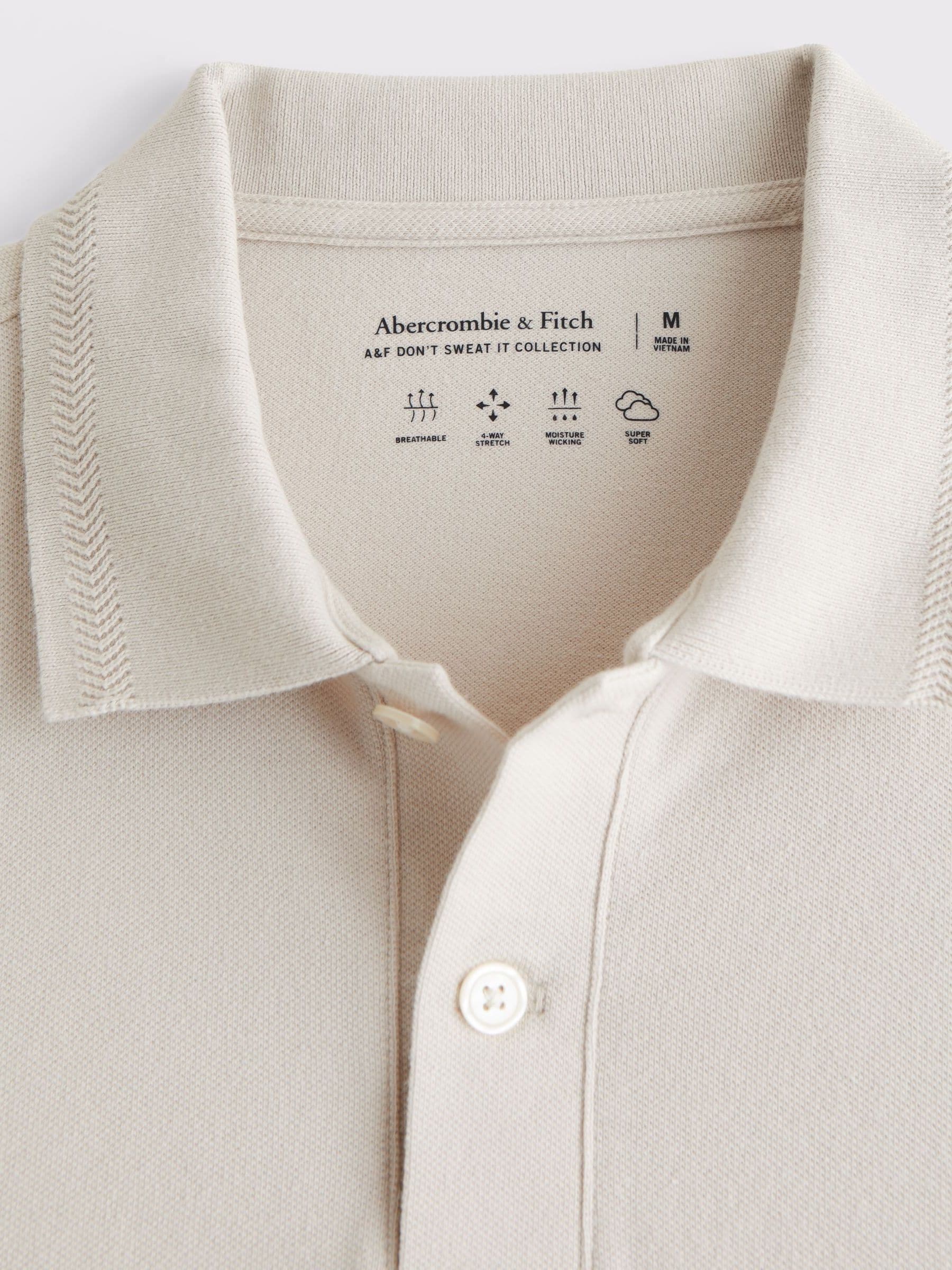 white abercrombie polo shirt