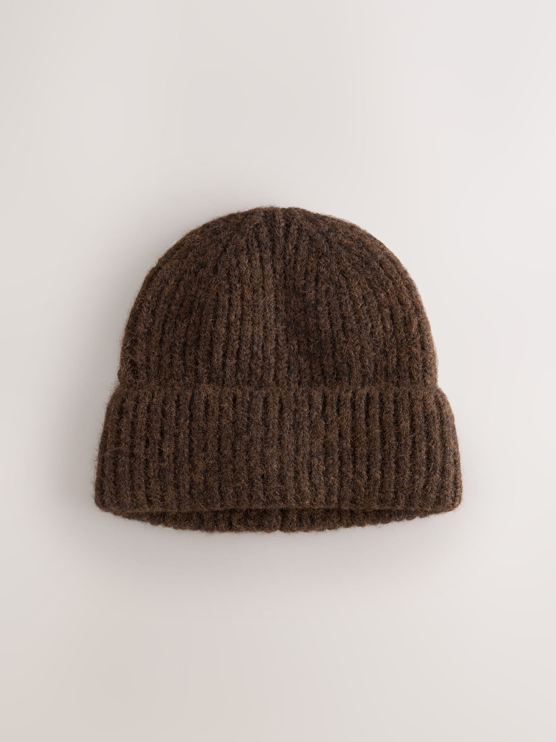 Buy Chocolate Brown Ribbed Beanie Containing Wool Hat from Next