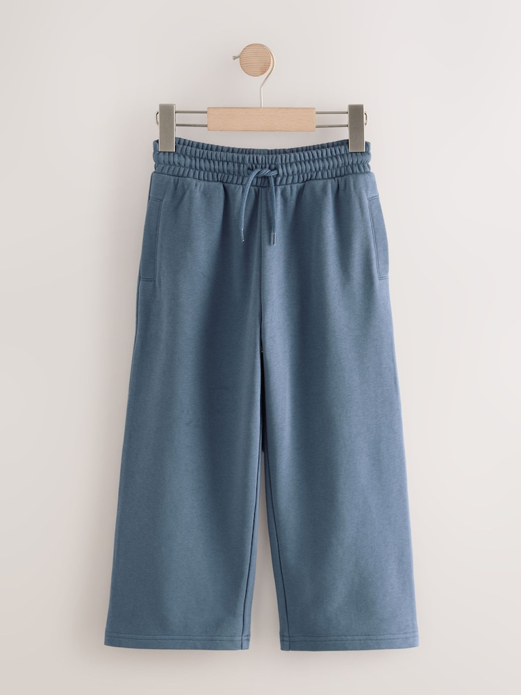 Mid Blue Wide Fit Basic Joggers (3-16yrs) - Image 1 of 4 Mid Blue Wide Fit Basic Joggers (3-16yrs) - Image 1 of 4
