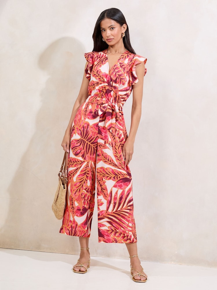 Lipsy Pink Palm Print Flutter Sleeve V-Neck Jumpsuit - Image 1 of 4 Lipsy Pink Palm Print Flutter Sleeve V-Neck Jumpsuit - Image 1 of 4