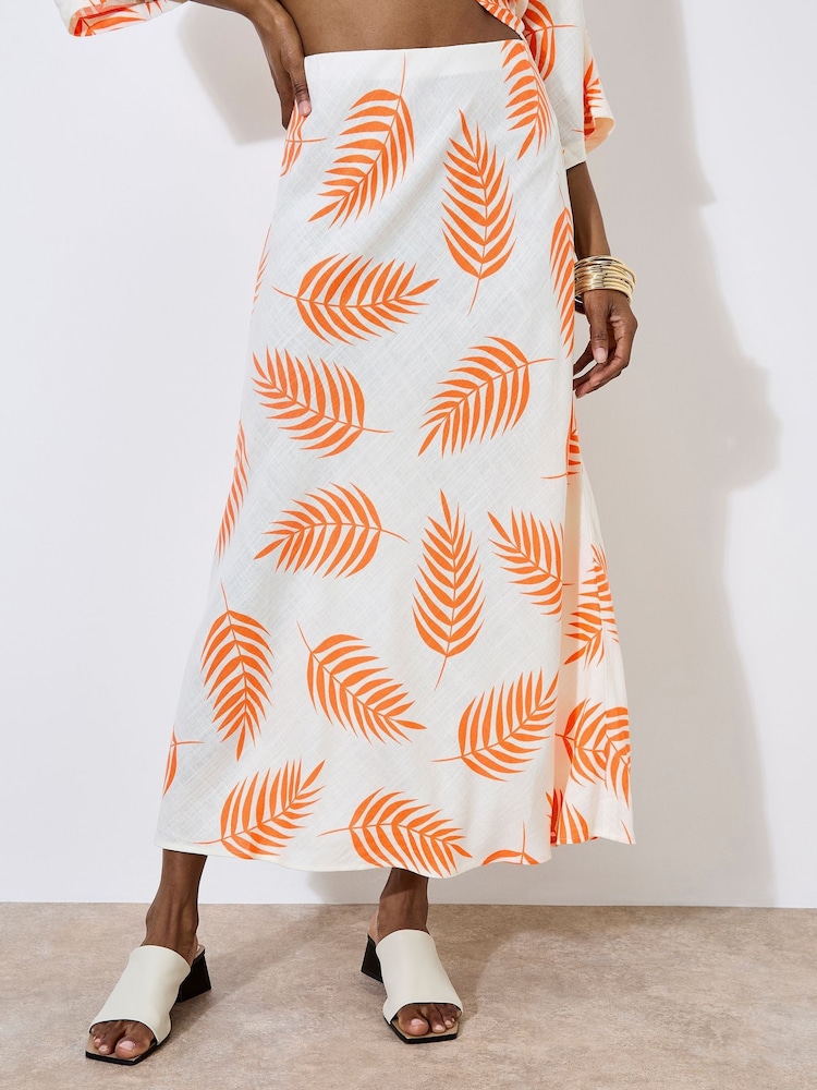 Apricot Cream Bias Cut Mono Palm Leaf Skirt - Image 1 of 4 Apricot Cream Bias Cut Mono Palm Leaf Skirt - Image 1 of 4