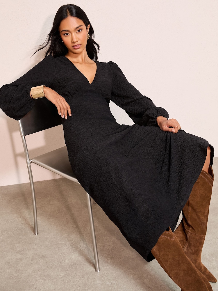 black long sleeve v neck midi dress ASOS DESIGN v neck long sleeve ribbed midi dress with front split detail in black