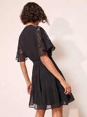 Friends Like These Black Lace Insert Flutter sleeve Mini Dress - Image 5 of 5
