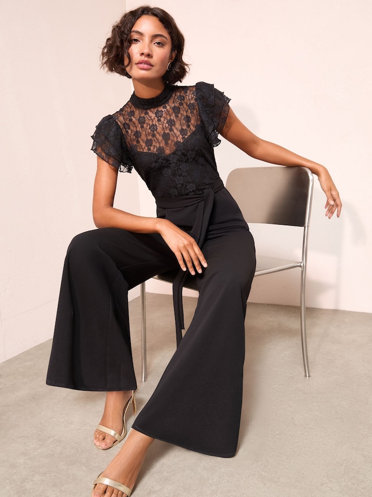 Friends Like These Black Lace Scuba Mix Frill Sleeve Jumpsuit - Image 1 of 4