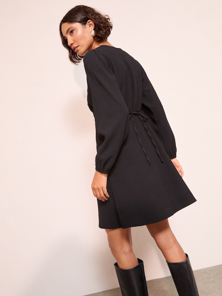 Friends Like These Black Jersey Long Sleeve Lace Trim V-Neck Mini Dress - Image 4 of 4 Friends Like These Black Jersey Long Sleeve Lace Trim V-Neck Mini Dress - Image 4 of 4