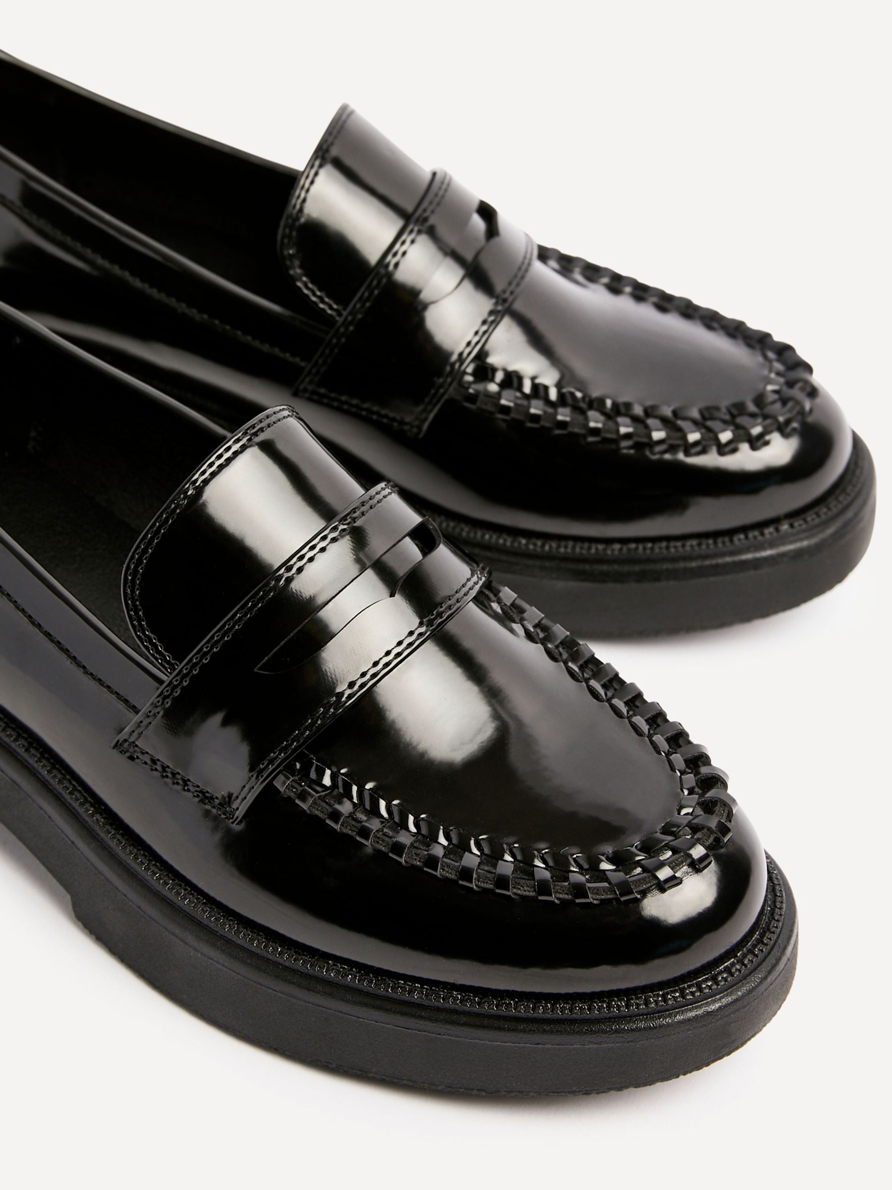 Buy Linzi Black Direction Chunky Loafers With Woven Detail from