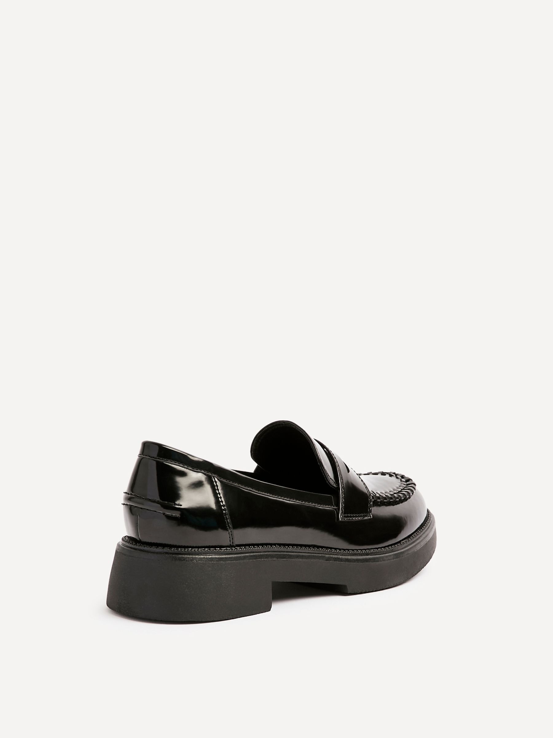Buy Linzi Black Direction Chunky Loafers With Woven Detail from