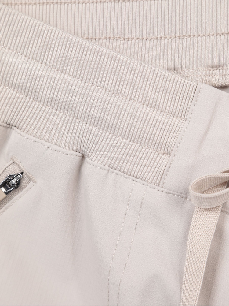 Natural - Pantalones de explorador con protección UV, cremallera de secado rápido para mujer de Mountain Warehouse - Imagen 11 de 11 Natural - Pantalones de explorador con protección UV, cremallera de secado rápido para mujer de Mountain Warehouse - Imagen 11 de 11