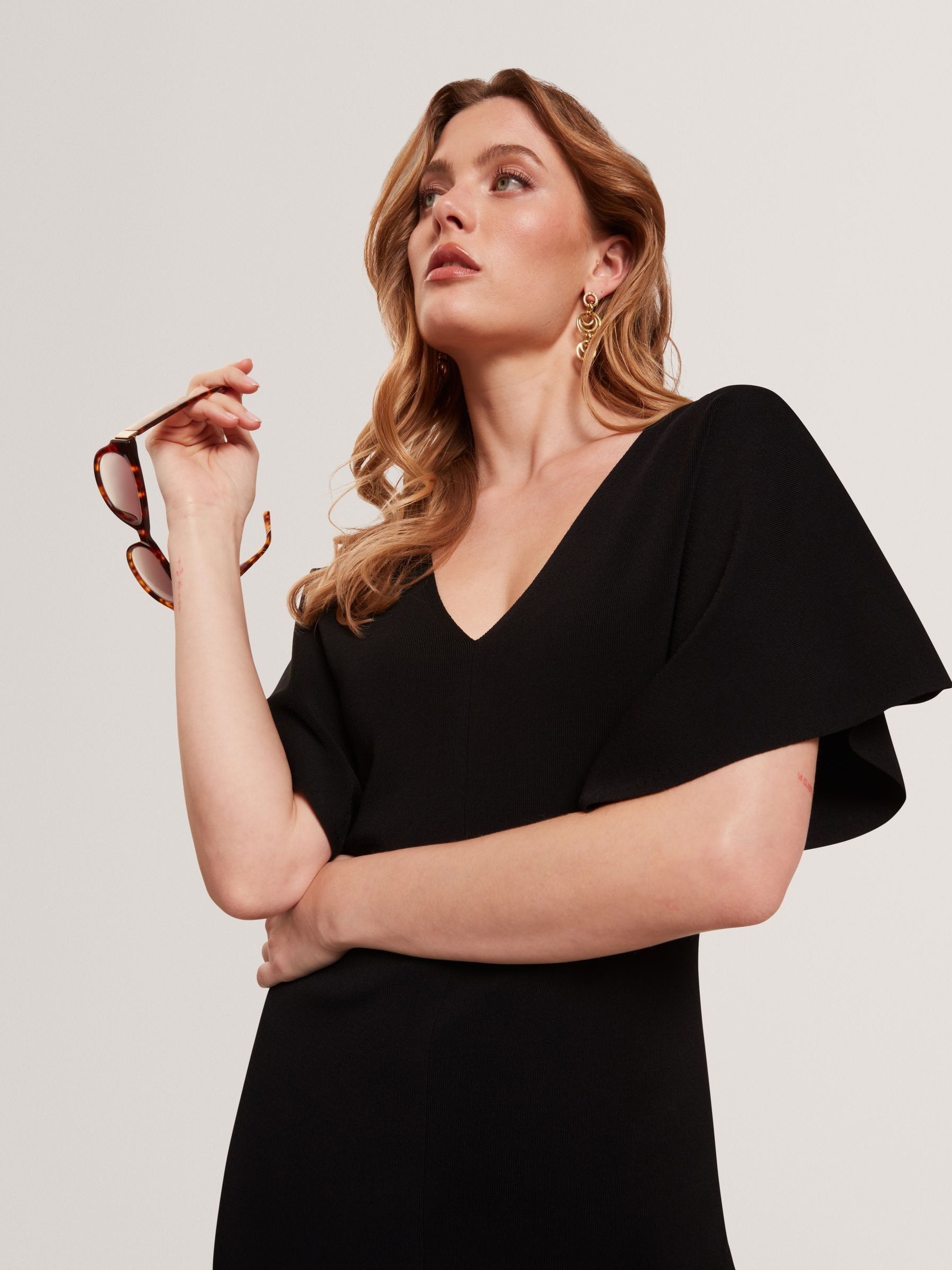 TED BAKERブラックドレス Buy Ted Baker Black Rebecca V-Neck Knitted Midi Dress from the