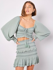 Apricot Green Smocked Tassel Crop Long Sleeve Blouses - Image 1 of 4