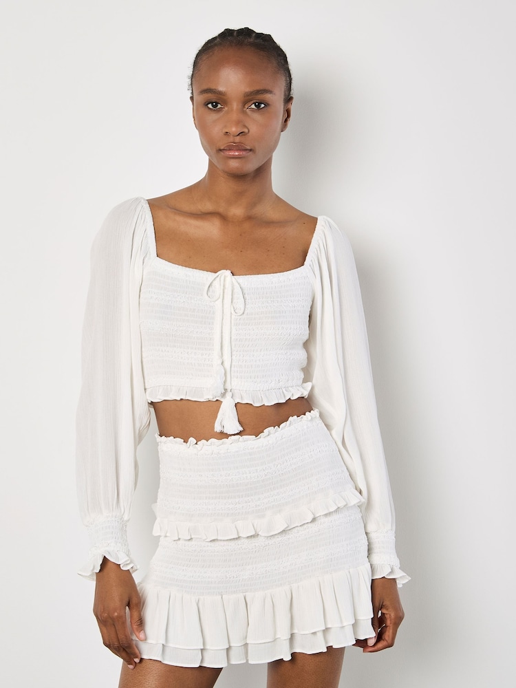 Apricot White Smocked Tassel Crop Long Sleeve Blouses - Image 1 of 4
