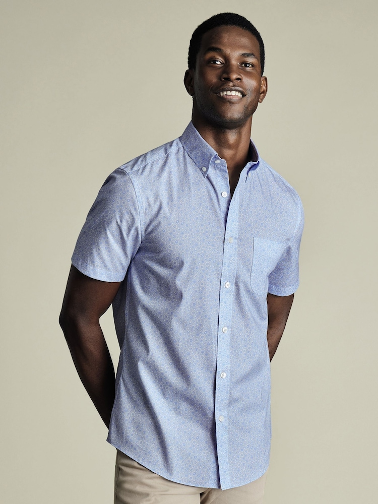 Charles Tyrwhitt Blue Slim Fit Fish Slim Fit Short Sleeve Non-Iron Print 100% Cotton Shirt - Image 1 of 5 Charles Tyrwhitt Blue Slim Fit Fish Slim Fit Short Sleeve Non-Iron Print 100% Cotton Shirt - Image 1 of 5