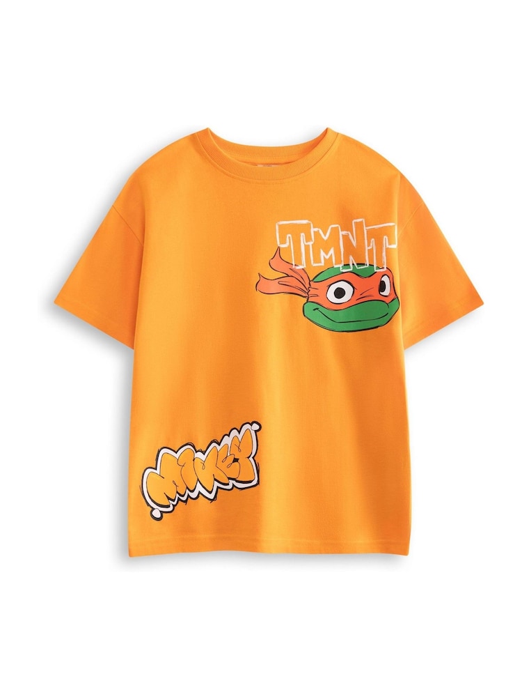 Vanilla Underground Orange Boys Teenage Mutant Ninja Turtles Mikey Short Sleeved 100% Cotton T-Shirt - Image 1 of 6 Vanilla Underground Orange Boys Teenage Mutant Ninja Turtles Mikey Short Sleeved 100% Cotton T-Shirt - Image 1 of 6