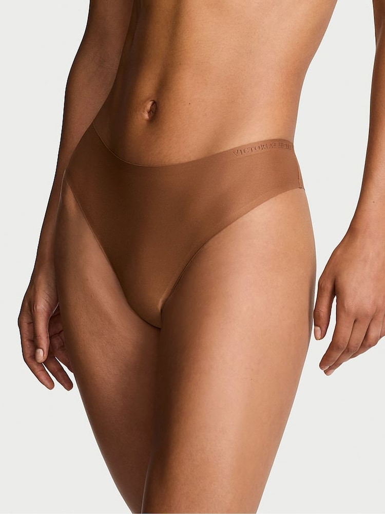 Victoria's Secret Caramel Nude Thong Mid-Rise Knickers - Image 1 of 3 Victoria's Secret Caramel Nude Thong Mid-Rise Knickers - Image 1 of 3