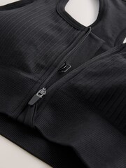 أسود - حمالة صدر رياضية بسحاب أمامي دون خياطة، دعم متوسط - صورة 6 من 7